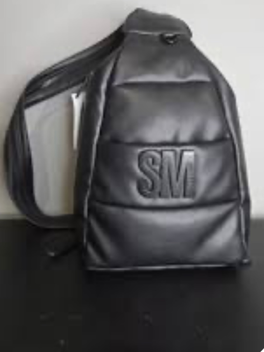 Steve Madden Black Quilted Sling Backpack with SM Emboss